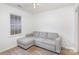 Cozy living room featuring a comfortable sectional sofa at 14023 Kedleston Rd, Huntersville, NC 28078