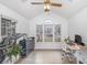 Sunlit home office with built-in workspace and window seat at 14023 Kedleston Rd, Huntersville, NC 28078