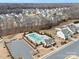 Community swimming pool and parking area, aerial view at 1503 Brooksland Pl, Waxhaw, NC 28173