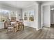 Bright dining room with hardwood floors and a window seat at 1503 Brooksland Pl, Waxhaw, NC 28173