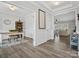 Bright entryway with hardwood floors and views into living room and office at 1503 Brooksland Pl, Waxhaw, NC 28173