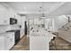 Modern kitchen with island and stainless steel appliances at 1503 Brooksland Pl, Waxhaw, NC 28173