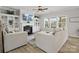 Living room includes a fireplace and built-in shelving at 1503 Brooksland Pl, Waxhaw, NC 28173