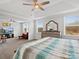 Main bedroom with sitting area and large windows at 1503 Brooksland Pl, Waxhaw, NC 28173