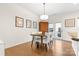 Bright dining area with a modern table and chairs, adjacent to the kitchen at 1554 Kee Ct, Charlotte, NC 28203