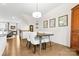 Dining area with modern table and chairs, and access to a backyard at 1554 Kee Ct, Charlotte, NC 28203