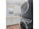 Laundry room with washer, dryer, and ample counter space at 162 Ravencrest Dr, Statesville, NC 28625