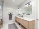 Modern bathroom with double sinks and marble tile at 200 Barra Dr, Waxhaw, NC 28173