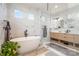 Spa-like bathroom with a free-standing tub and walk-in shower at 200 Barra Dr, Waxhaw, NC 28173