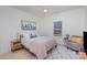 Bright bedroom with a queen bed and large window at 200 Barra Dr, Waxhaw, NC 28173