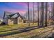 Brick home with covered patio and wooded backyard at 200 Barra Dr, Waxhaw, NC 28173