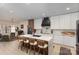 Modern kitchen with white cabinets and a large island at 200 Barra Dr, Waxhaw, NC 28173