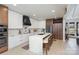 Modern kitchen featuring white cabinets and a marble island at 200 Barra Dr, Waxhaw, NC 28173