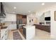 Modern kitchen with a large island and stainless steel appliances at 200 Barra Dr, Waxhaw, NC 28173