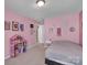 Bedroom with queen bed and playful decor at 2056 Angel Oak Dr, Fort Mill, SC 29715