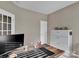 Home office with wooden desk, filing cabinet, and large window at 2056 Angel Oak Dr, Fort Mill, SC 29715