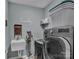 Laundry room with washer, dryer, and utility sink at 2056 Angel Oak Dr, Fort Mill, SC 29715