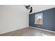 Bedroom with ceiling fan and blue accent wall at 2146 S Main St, Kannapolis, NC 28081