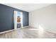 Bright bedroom with neutral walls and wood-look flooring at 2146 S Main St, Kannapolis, NC 28081