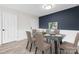 Dining room with glass-top table and beige chairs at 2146 S Main St, Kannapolis, NC 28081