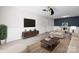 Living room with contemporary furnishings and wood-look floors at 2146 S Main St, Kannapolis, NC 28081