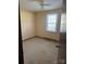 Bright bedroom with ceiling fan and window at 219 W Edison Dr, Statesville, NC 28625