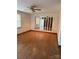 Living room with laminate floors and ceiling fan at 219 W Edison Dr, Statesville, NC 28625