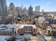 Building and cityscape aerial view at 224 N Poplar St # 22, Charlotte, NC 28202