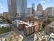 Aerial view of building and city skyline at 224 N Poplar St # 22, Charlotte, NC 28202