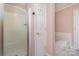 Bathroom with a shower and bathtub, and a pink wall at 2241 Londonderry Dr, Gastonia, NC 28056