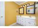 Bright bathroom with double sinks and updated light fixtures at 2241 Londonderry Dr, Gastonia, NC 28056