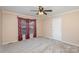 Bedroom with neutral walls, carpeting, and a ceiling fan at 2241 Londonderry Dr, Gastonia, NC 28056