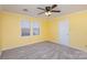 Bedroom with carpet, ceiling fan and double door closet at 2241 Londonderry Dr, Gastonia, NC 28056