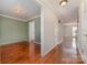 Bright entryway with hardwood floors and neutral-colored walls at 2241 Londonderry Dr, Gastonia, NC 28056