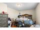 Main bedroom with wood furniture and window at 225 American Dr, Salisbury, NC 28147