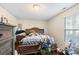 Bedroom with double bed, dresser, and window at 225 American Dr, Salisbury, NC 28147