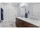 Clean bathroom with double vanity, marble countertops, and shower/tub combo at 2328 Barry St, Charlotte, NC 28205