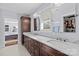 Double vanity bathroom with marble countertops and walk-in shower at 2328 Barry St, Charlotte, NC 28205