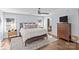 Main bedroom with hardwood floors and dresser at 2328 Barry St, Charlotte, NC 28205