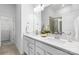 Bright bathroom featuring double sinks, modern fixtures, and a glass-enclosed shower at 3113 Beacon Heights Rd, Indian Land, SC 29707