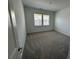 Bright bedroom with neutral carpeting, providing a calm and inviting space for rest and relaxation at 3113 Beacon Heights Rd, Indian Land, SC 29707