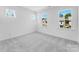 Large bedroom with neutral carpet and two windows at 3113 Beacon Heights Rd, Indian Land, SC 29707