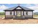 Close up exterior view of a new community clubhouse featuring stone and siding accents and a stylish architectural design at 3113 Beacon Heights Rd, Indian Land, SC 29707