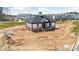 New clubhouse features a modern exterior, architectural design elements, and surrounding undeveloped landscape at 3113 Beacon Heights Rd, Indian Land, SC 29707