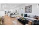 Open-concept living area with modern furnishings and seamless flow to the kitchen at 3113 Beacon Heights Rd, Indian Land, SC 29707