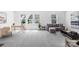 Bright living area with neutral carpet, large windows, stylish furniture, and ample natural light at 3113 Beacon Heights Rd, Indian Land, SC 29707