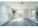 Bright, airy living room featuring hardwood floors and large windows, creating a welcoming atmosphere at 3416 Polkville Rd, Shelby, NC 28150