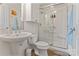 Clean bathroom with a walk-in shower and white sink at 3572 Artists Way, Charlotte, NC 28205