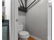 Small toilet area with hardwood floors at 3572 Artists Way, Charlotte, NC 28205