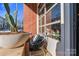 Small patio with seating area and large cactus at 3572 Artists Way, Charlotte, NC 28205